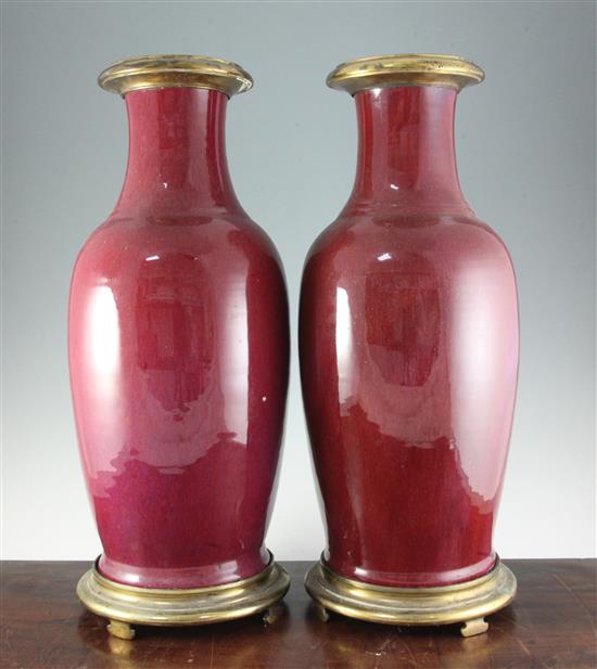 A pair of large Chinese flambe glazed baluster vases, late Qing dynasty, total height 60cm, necks reduced